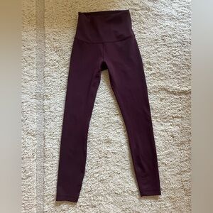 Lululemon Wunder Train High Rise Tight 25” size 2, Merlot